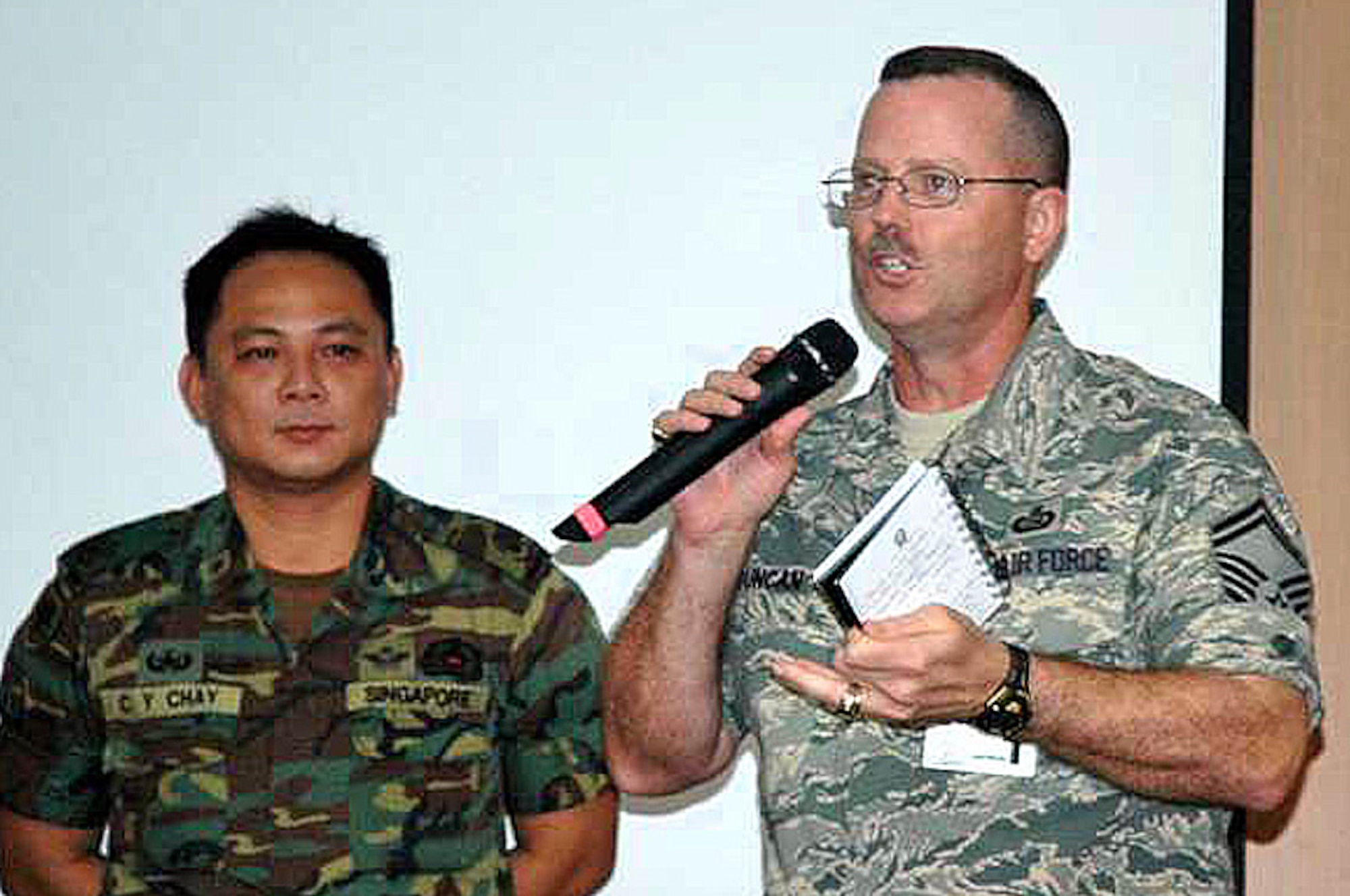 Senior Master Sgt. Duncan, director of operations at Kadena's Erwin Professional Military Education Center, is  attending the Singapore's Armed Forces Warrant Officer School in search of valuable insights to add to the U.S. Air Force's professional military education. (Courtesy photo)   