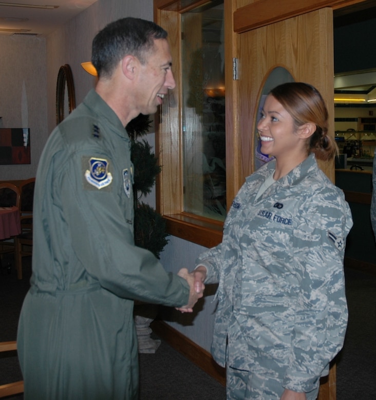 14th Air Force Commander Lt. Gen. Larry James started his visit to Patrick Air Force Base Feb. 17 with a breakfast at the Riverside Dining Facility, where he met Airman 1st Class Carmen Stevenson of the 45th Space Communications Squadron. (U.S. Air Force photo by Airman 1st Class David Dobrydney)