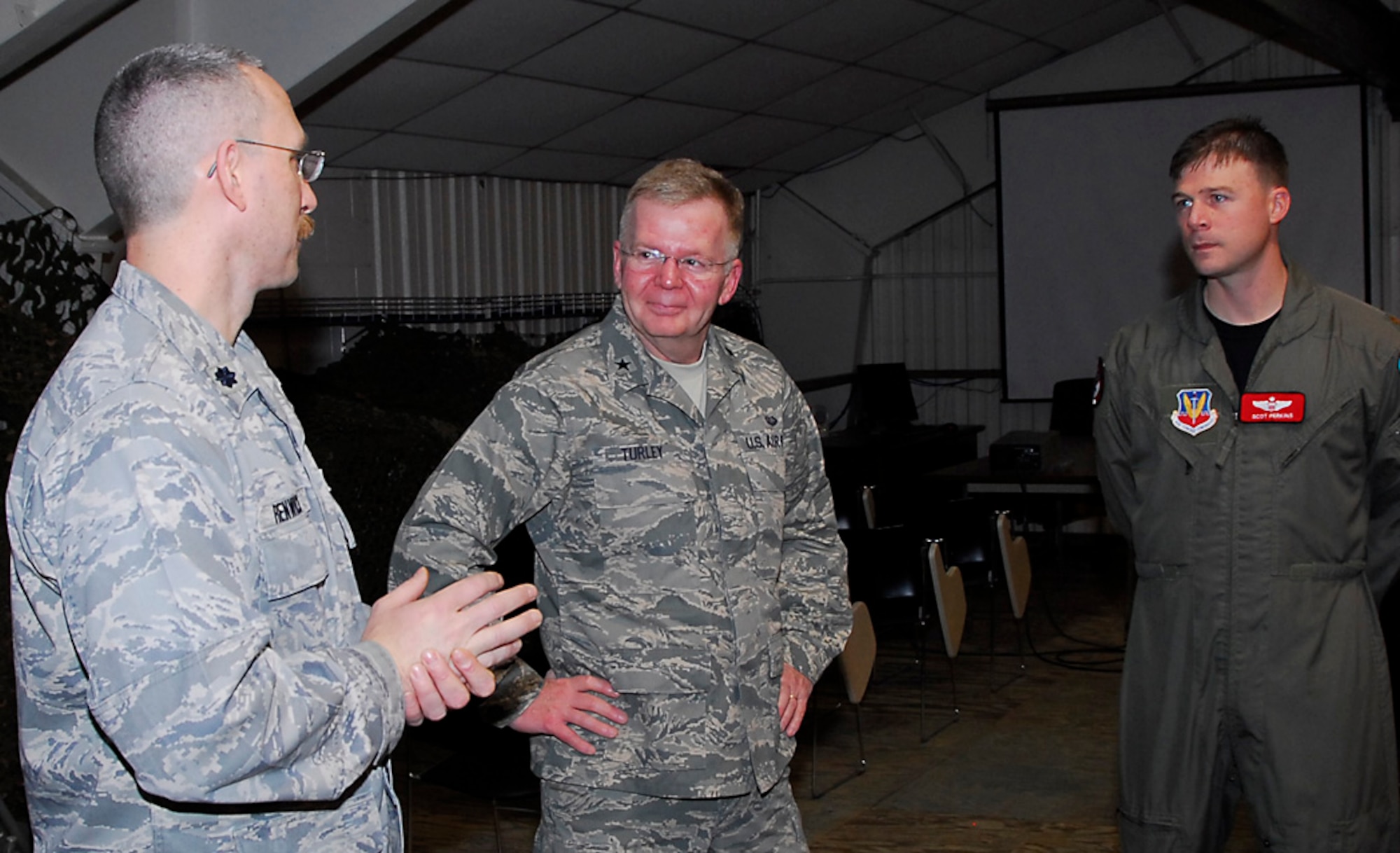 (L to R) Lt. Col. Patrick Renwick, 113th ASOS commander; Brig. Gen. F. Andrew Turley, Air National Guard Assistant to the Command Staff Judge Advocate; Maj. Scot Perkins, Air Liaison Officer