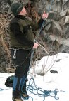 Ryan Murphy, Outdoor Recreation Connection staff member, belays for an ice climber during a Valentine’s Day ice climbing trip coordinated by the ORC. Belaying is a technique used in climbing to control the rope and ensure the safety of the climber. (U.S. Air Force Photo / Senior Airman Kali L. Gradishar)