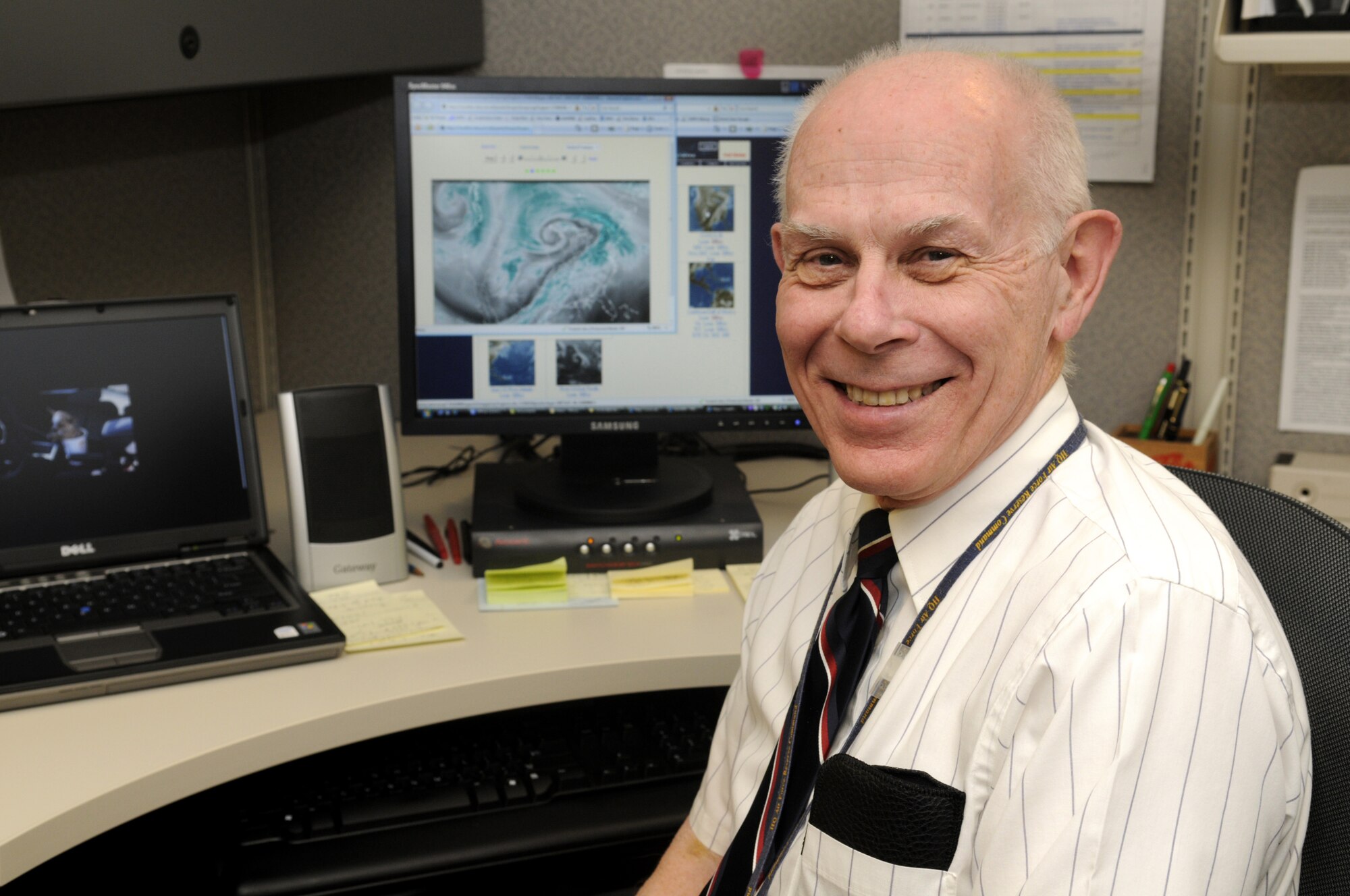 Lawrence Baker, head of AFRC command weather, explains the evolution of thunderstorm forecasting. Mr. Baker has served his country for a combined total of 50 years in both the U. S. Navy and the civil service. He will conclude his half-century of service by retiring March 2. U. S. air Force photo by Sue Sapp