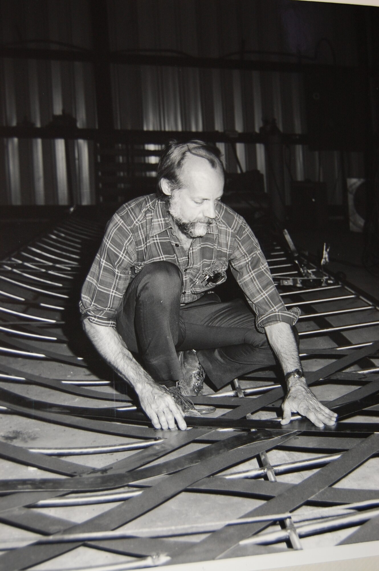 Mr. Godwin works on the Wright Flyer project in his Brundidge workshop in 1985. The Maxwell Wright Flyer was the first of four such exhibits he has built. (Courtesy photo)