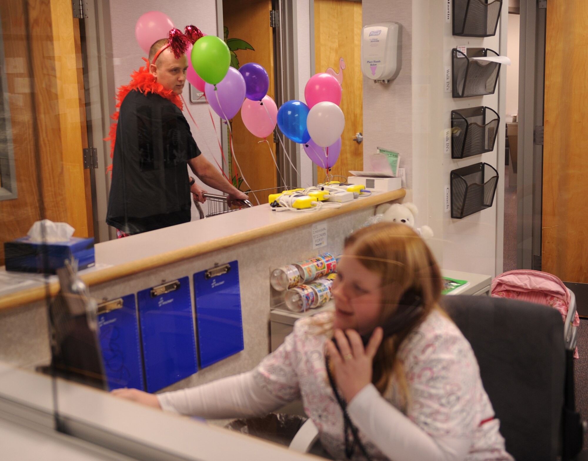 WHITEMAN AIR FORCE BASE, Mo. –Cupid, portrayed by Tech. Sgt. Jason Herndon, 509th Medical Operations Squadron, goes on the prowl for Team Whiteman members in need of Valentine Candy Grams Feb. 13. The 509th Medical Group Cupid made his rounds to raise money for unit events. (U.S. Air Force photo/Senior Airman Stephen Linch)