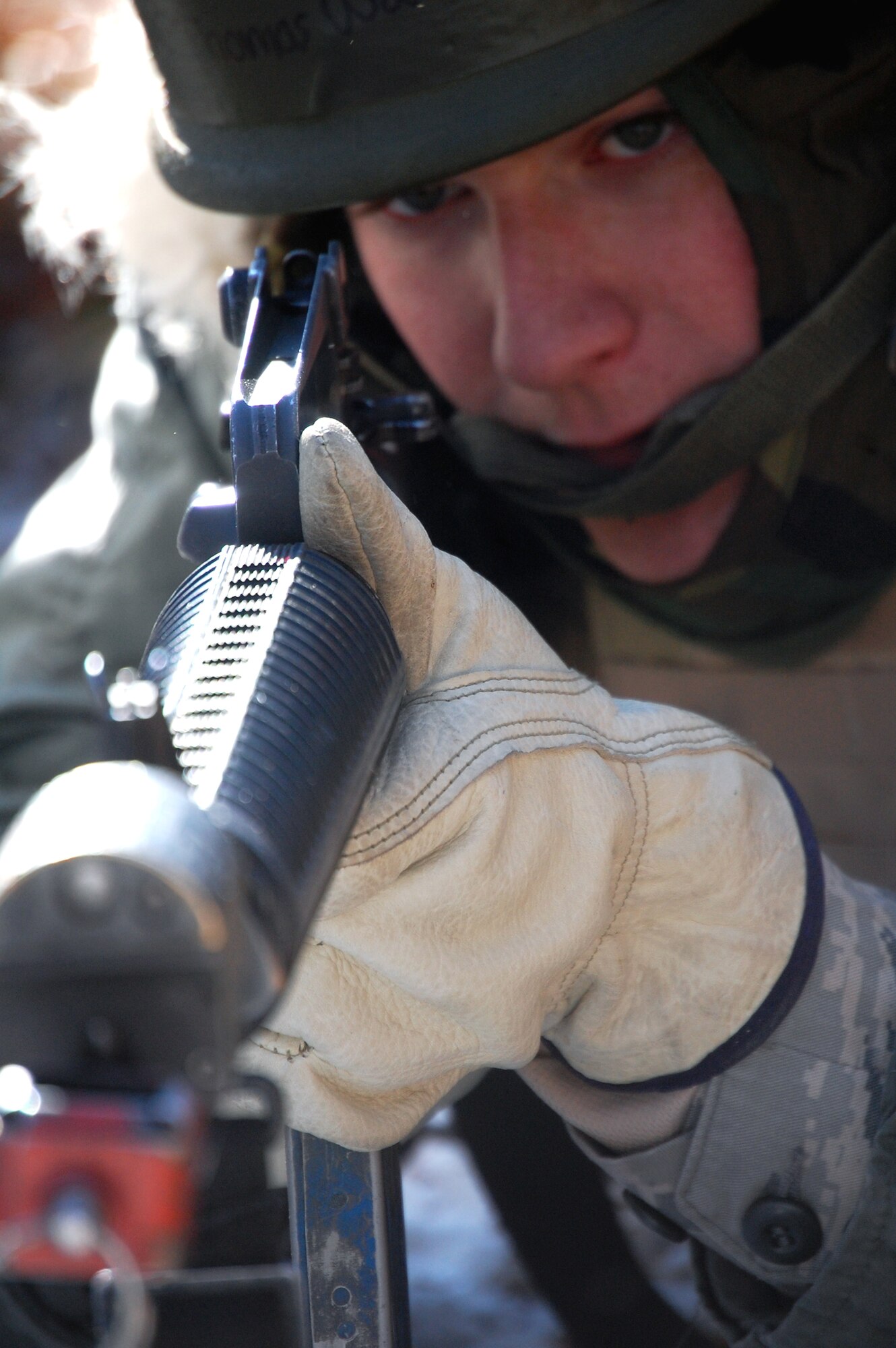 Airman 1st Class Thomas Watson, a student in the Advanced Contingency Skills Training Course, responds to a scenario during a training session in combat first aid on Feb. 5, 2009, on a Fort Dix, N.J., range.  ACST is taught by the U.S. Air Force Expeditionary Center's 421st Combat Training Squadron and prepares Airmen for upcoming deployments.  (U.S. Air Force Photo/Tech. Sgt. Scott T. Sturkol)
