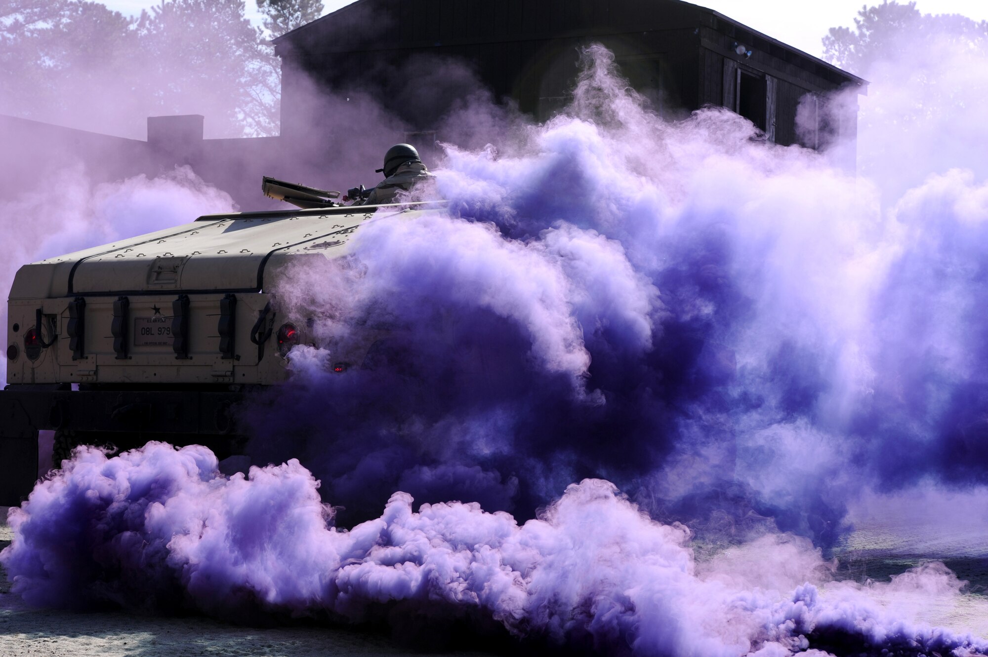 Students in the Air Force Advanced Contingency Skills Training Course, react to a scenario during convoy operations training on Feb. 17, 2009, at a range on Fort Dix, N.J.  The course is taught by the U.S. Air Force Expeditionary Center's 421st Combat Training Squadron, also at Fort Dix.  The course prepares Airmen for upcoming deployments through training in everything from convoy operations and combat first aid to patrolling and tactics.  (U.S. Air Force Photo/Staff Sgt. Nathan Bevier)
