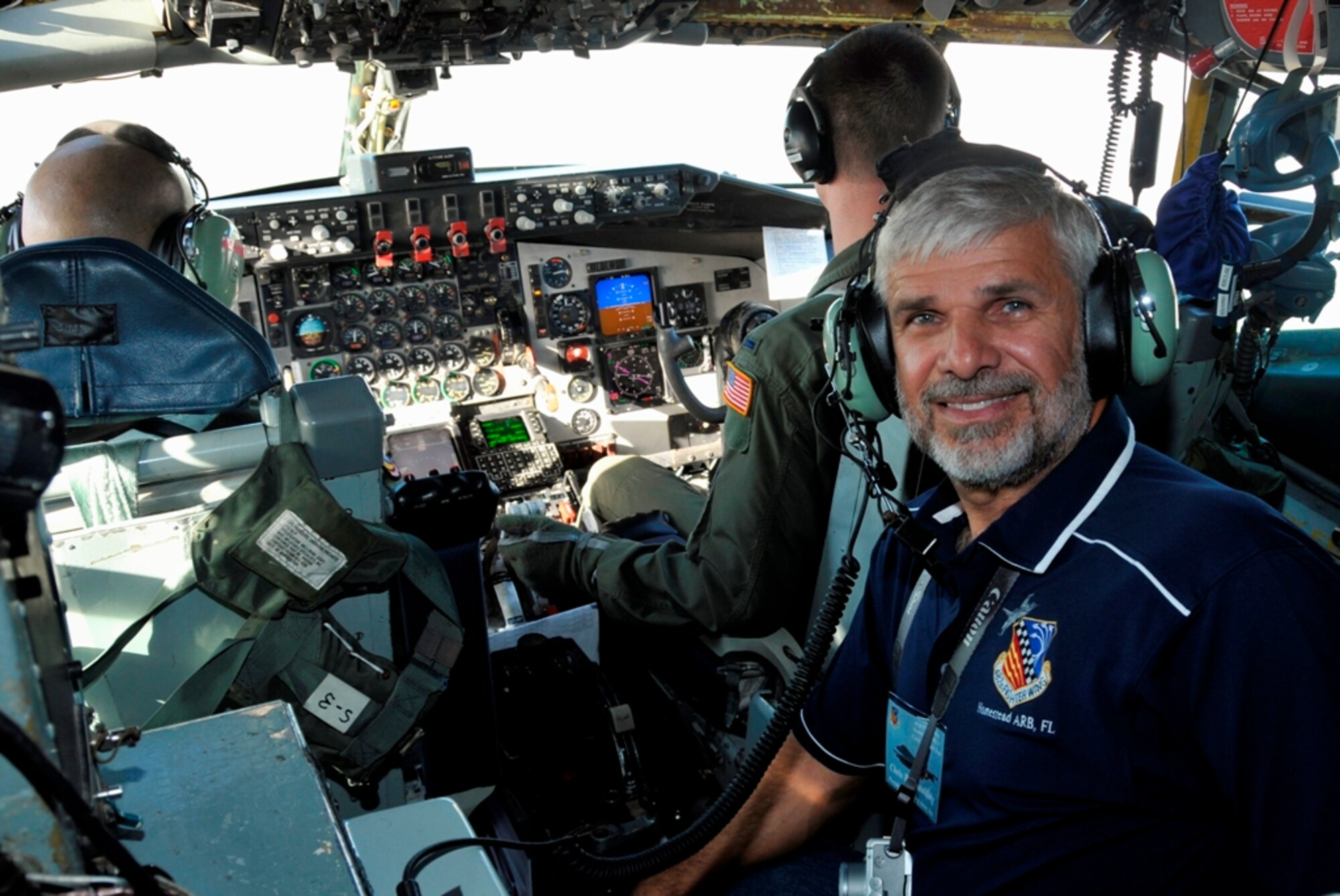 Mr. Chris Spaulding, President of Spaulding Associates, Inc. of Homestead, Fla., rides in the cockpit of a KC-135 Stratotanker during the Civic Leader Flight on Feb. 12-13. Mr. Spaulding and 34 other influential leaders from the Miami area took off from Homestead Air Reserve Base to Keesler AFB, Miss., and Lackland AFB, Texas, during the two-day tour. (U.S. Air Force photo/Tim Norton)