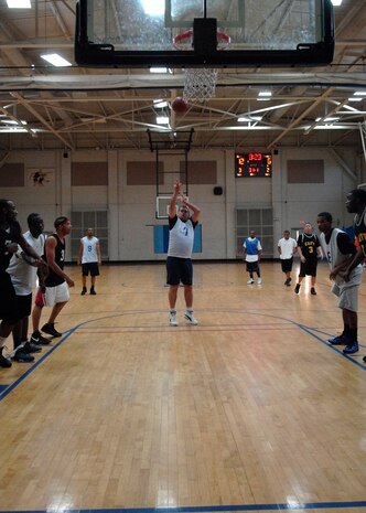 Nathan Wolfe shoots his free throw during the intramural basketball game at the Fitness and Sports Center here Feb. 18. FSS dominated LRS 2 72-25. Wolfe is with the 437th Logistics Readiness Squadron. (U.S. Air Force photo/Senior Airman Katie Gieratz)