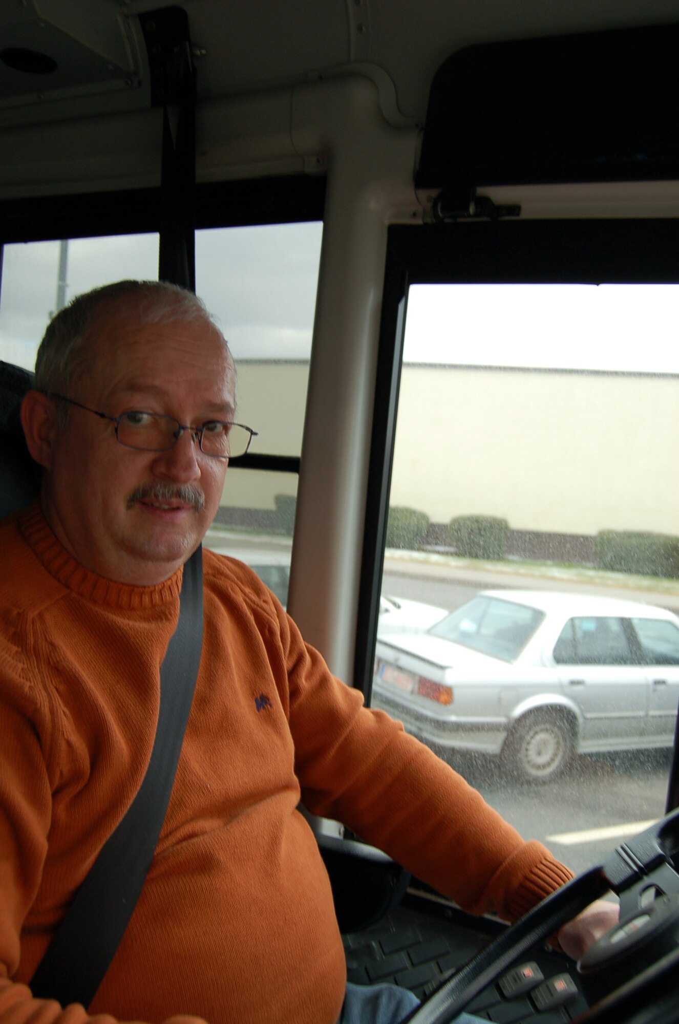 SPANGDAHLEM AIR BASE, Germany – Matthias Assmann is a base shuttle bus driver. The Spangdahlem shuttle stops at more than 15 locations on the base weekdays beginning at 5:27 a.m. unitl 10:49 p.m. (U.S. Air Force photo by Airman 1st Class Staci Miller)