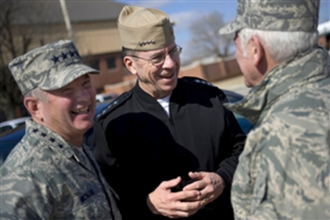 U.S. Navy Adm. Mike Mullen, middle, chairman of the Joint Chiefs of Staff, and U.S.
Air Force Gens. Ducan McNabb, commander of U.S. Transportation Command, and Arthur J. Lichte, commander of Air Mobility Command, share a laugh before Mullen departs Scott Air Force Base, Ill., Feb. 19, 2009. Mullen is on a two-day trip visiting airmen on Minot and Scott Air Force bases and soldiers on Fort Campbell, Ky. 