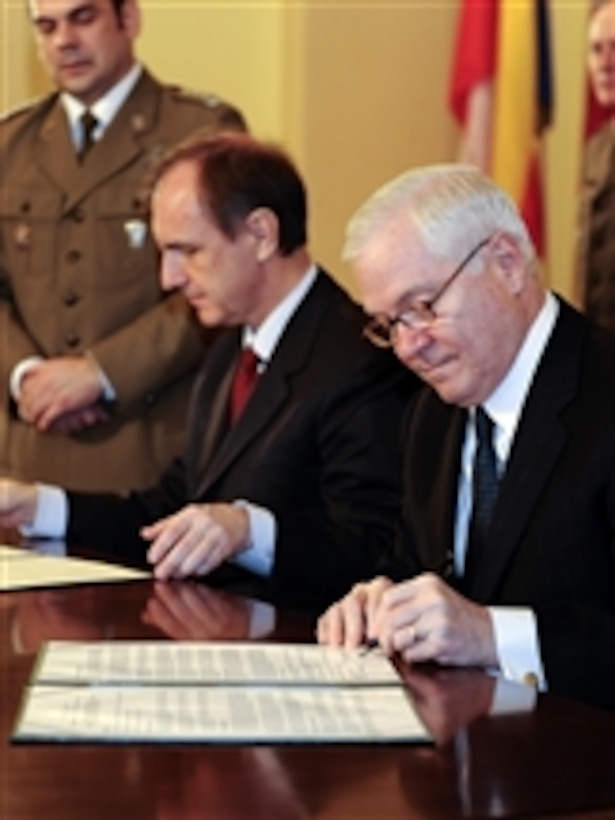 Secretary of Defense Robert M. Gates signs a memorandum of understanding with Polish Defense Minister Bogdan Klich at the II Mech Corps Headquarters in Krakow, Poland, on Feb. 19, 2009.  Gates is in Poland to attend the Krakow Defense Ministry Conference.  