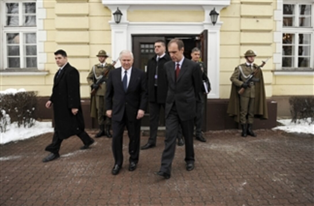 Secretary of Defense Robert M. Gates walks with Polish Defense Minister Bogdan Klich at the II Mech Corps Headquarters in Krakow, Poland, on Feb. 19, 2009.  Gates is in Poland to attend the Krakow Defense Ministry Conference.  