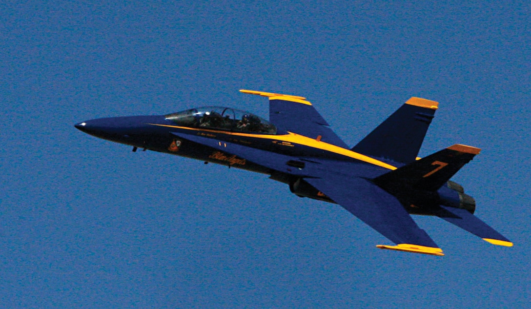 Mythbusters co-host Adam Savage rides in the back seat of one of the Blue Angels’ F/A-18 Hornets as it breaks the sound barrier over the Barry M. Goldwater Range east of the Marine Corps Air Station in Yuma, Ariz., Feb. 18, 2009. The Blue Angels invited the popular Discovery Channel program to test effects of a sonic boom on different types of glass. The episode, filmed Febuary 2009, is scheduled to air June 10, 2009, at 9 p.m. EST on The Discovery Channel.