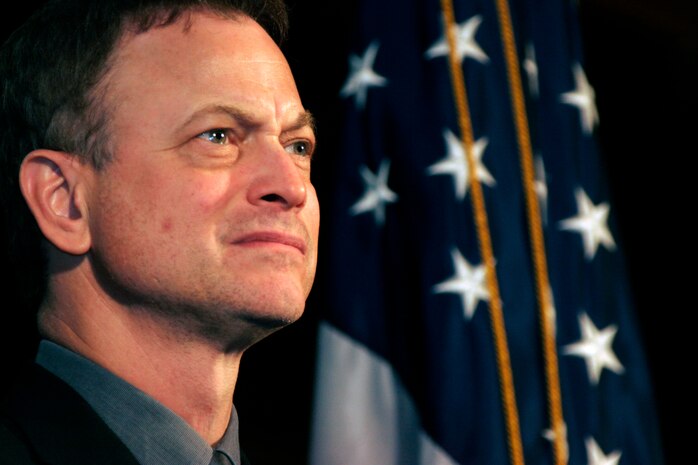Co-executive producer of 'Brothers at War' Gary Sinise participates in a question and answer session following the premiere of the movie Feb. 20 at the National Press Club. Jake Rademacher said he made the documentary to 'Bring the American people to the frontlines of the war in Iraq.'