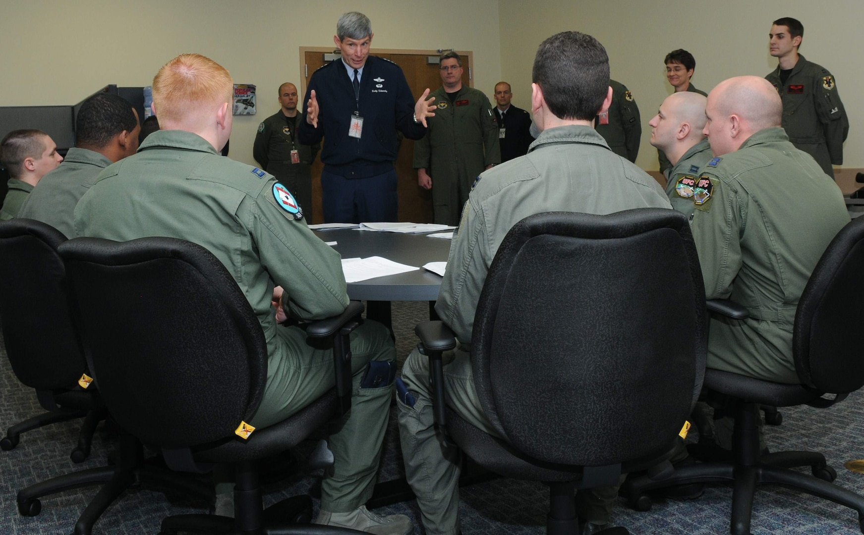 Air Force Chief of Staff Gen. Norton Schwartz discusses the Unmanned Aircraft System Fundamentals Course with students during his Feb. 19 visit to the 563rd Flying Training Squadron at Randolph Air Force Base, Texas. This is the first class of non-rated officers to attend the course (U.S. Air Force photo/Joel Martinez)
