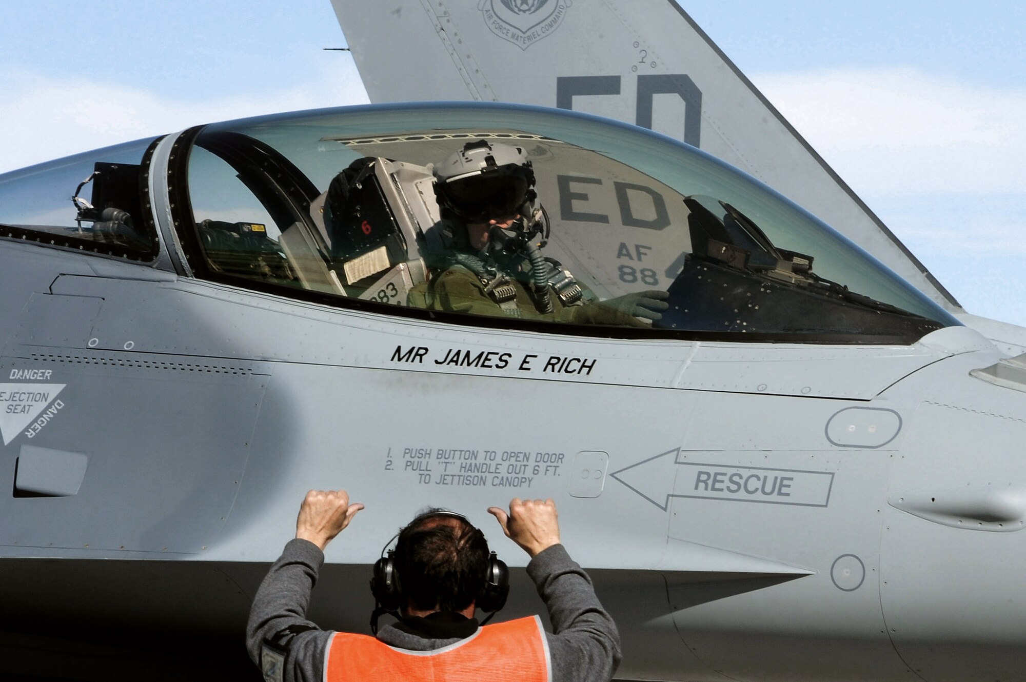 Alfonso Duran prepares to taxi an F-16 Fighting Falcon in support of Red Flag 09-2 Feb. 4 at Nellis Air Force Base, Nev. Red Flag is a multi-national exercise providing a realistic environment to practice combat scenarios. The experience gained during the exercise is vital to the survival of air crews in combat. Mr. Duran is a production supervisor assigned to the 416th Flight Test Squadron at Edwards Air Force Base, Calif. (U.S. Air Force photo/Senior Airman Nadine Y. Barclay)