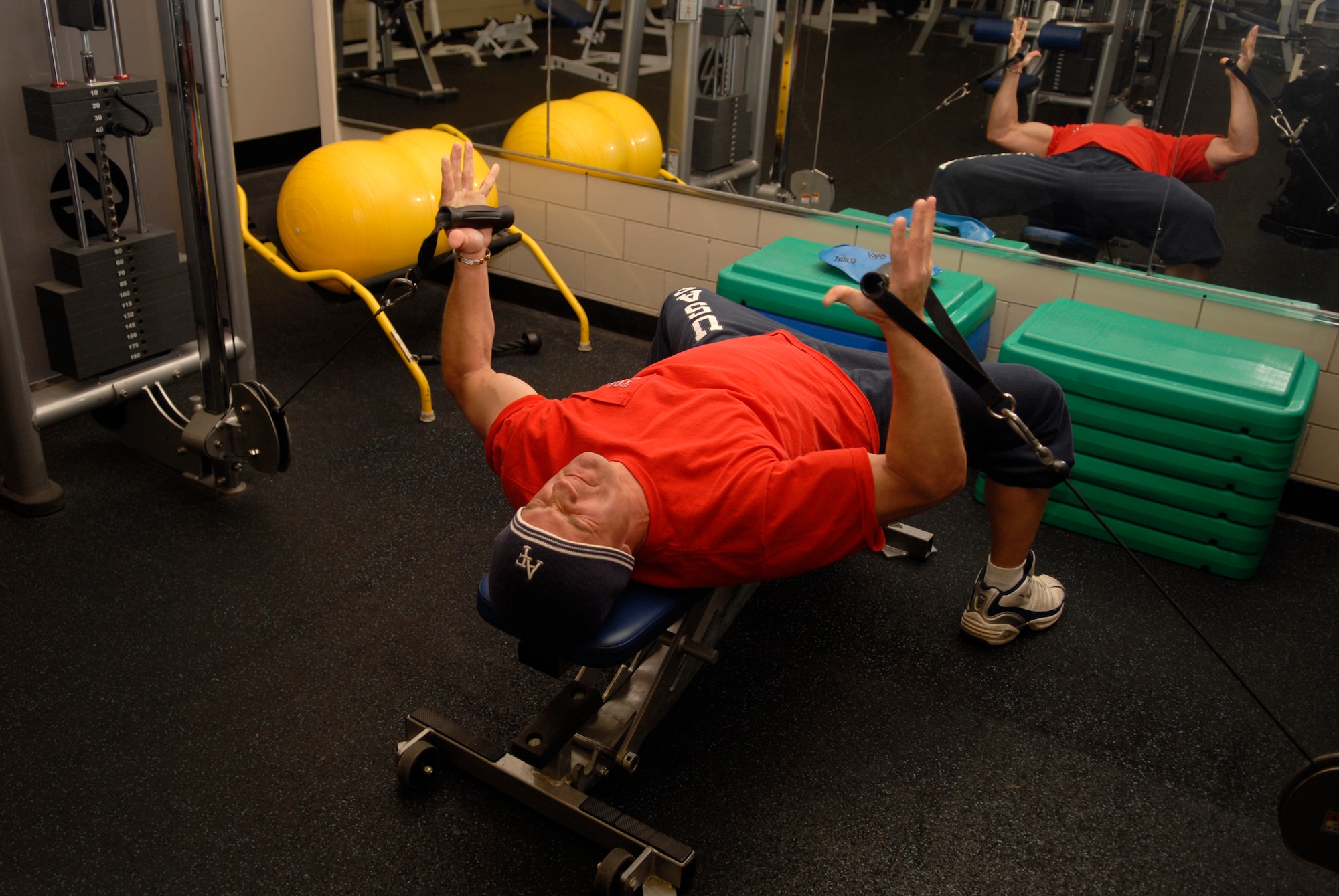 VANDENBERG AIR FORCE BASE, Calif. -- Lt. Col. Darold Hubbard, 14th Air Force, performs chest flies Feb. 10 at the Fitness Center here. Physical training is an essential part of being fit to fight and the mission. (U.S. Air Force photo/Senior Airman Christian Thomas)
