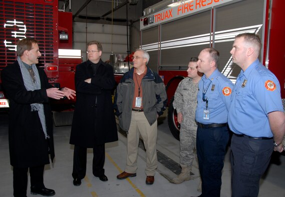 Jeff Skiles, co-pilot of the U.S. Airways Flight 1549 that manuevered a water landing on the Hudson River in New York in January, visits with members of the Dane County Regional Airport and Truax Field Fire Station Feb. 20. Mr. Skiles, a native of Oregon, Wis., was invited to tour the airport and fielded questions on the water landing itself, resuce efforts and even his appearance on the David Letterman Show.  (U.S. Air Force Photo by Staff Sgt. Jon LaDue)