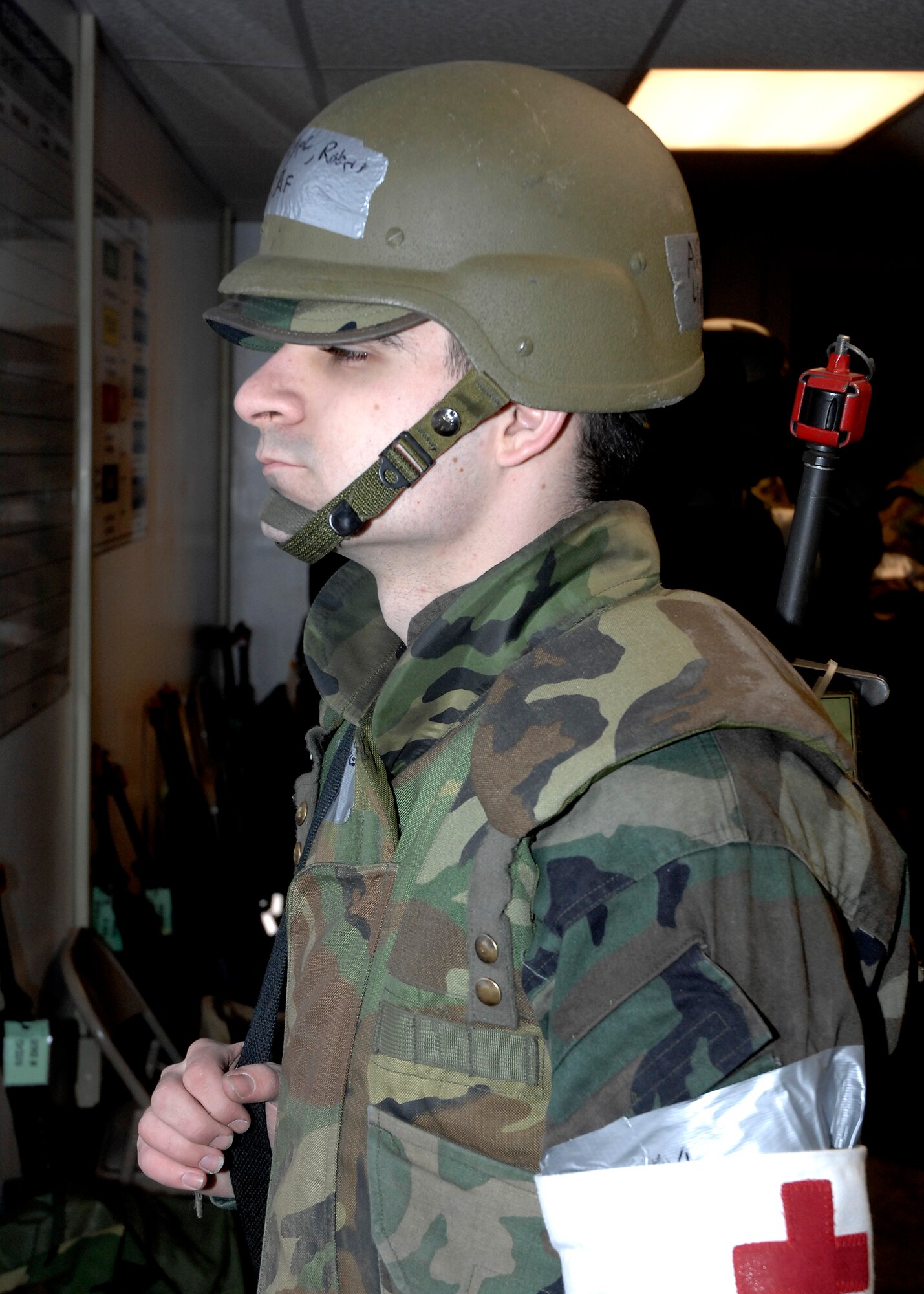 Airman Robert Nagel, 88 Inpatient Training Squadron medical technician, stands guard during a readiness exercise at the Warfighter Training Center at Wright-Patterson Air Force Base.  The exercise held Feb. 17-20 tested the base Airmen’s ability to react to a hostile environment with a host of threats. 