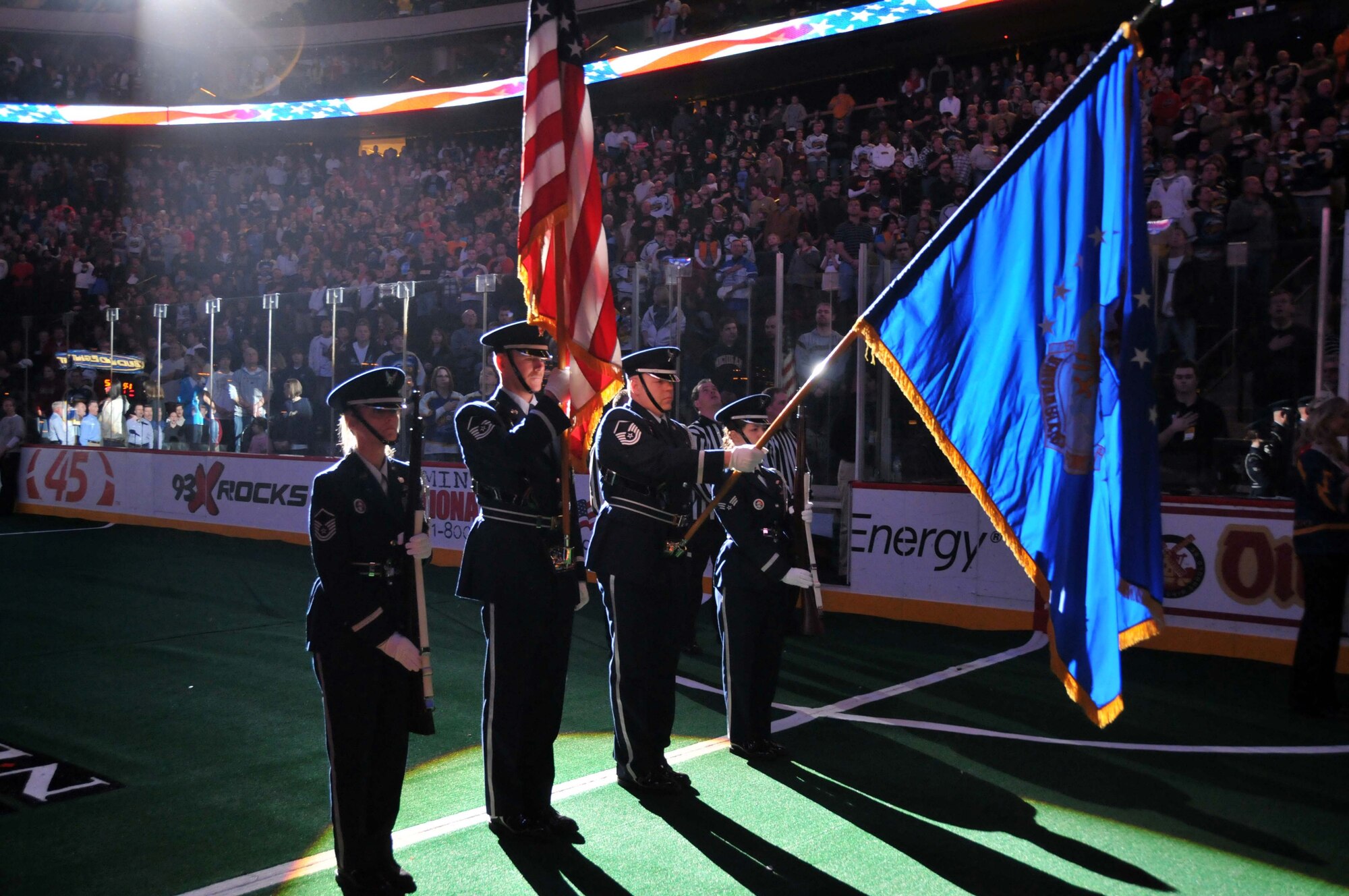 The 934th Honor Guard presents the colors at the Minnesota Swarm Lacrosse Team's military appreciation night at the Xcel Energy Center Feb. 7. (Air Force Photo/Tech. Sgt. Jeffrey Williams)
