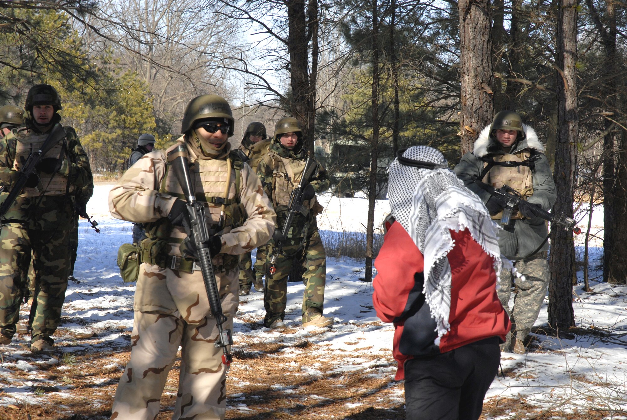 Students in the Advanced Contingency Skills Training Course 09-3 participate in a scenario for combat first aid on Feb. 5, 2009, on a Fort Dix, N.J., range.  The course, taught by the U.S. Air Force Expeditionary Center's 421st Combat Training Squadron, prepares Airmen for upcoming deployment providing combat skills training in everything from combat first aid and convoy operations to patrolling and tactics.  (U.S. Air Force Photo/Staff Sgt. Paul R. Evans)