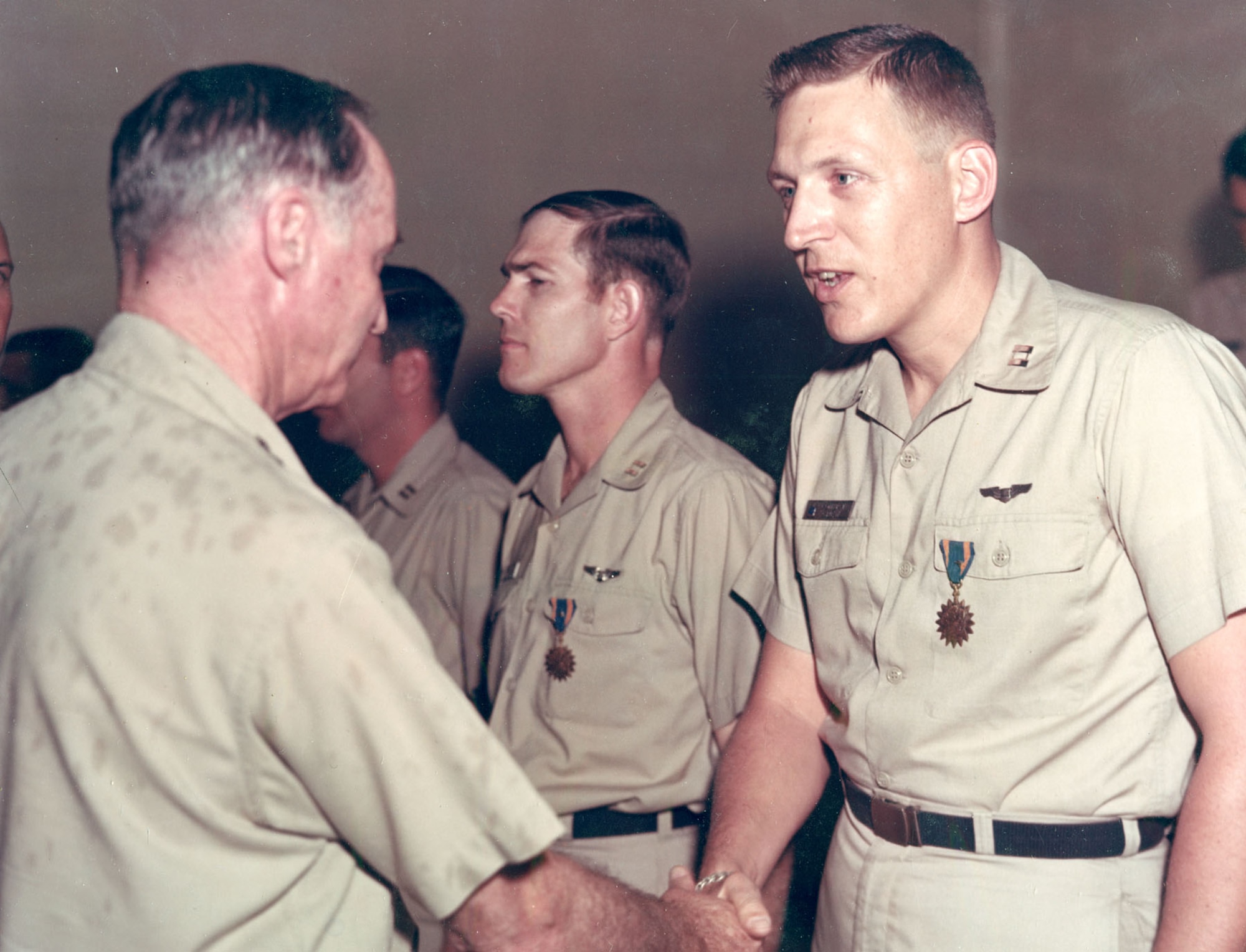 Capt. Detjen and other members of crew E-13. They are receiving the Air Medal from SAC Commander Gen. John P. McConnell for being the first 100 mission B-52 crew in Southeast Asia. (U.S. Air Force photo)