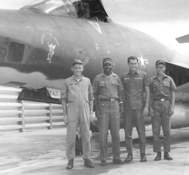 Maj. Roger McLain with his RF-101C, Herky the Hawk, and part of his groundcrew (l to r) Staff Sgt. C. Byrd, Airman 1st Class Walter, and Airman 1st Class Tamlynn. (U.S. Air Force photo)