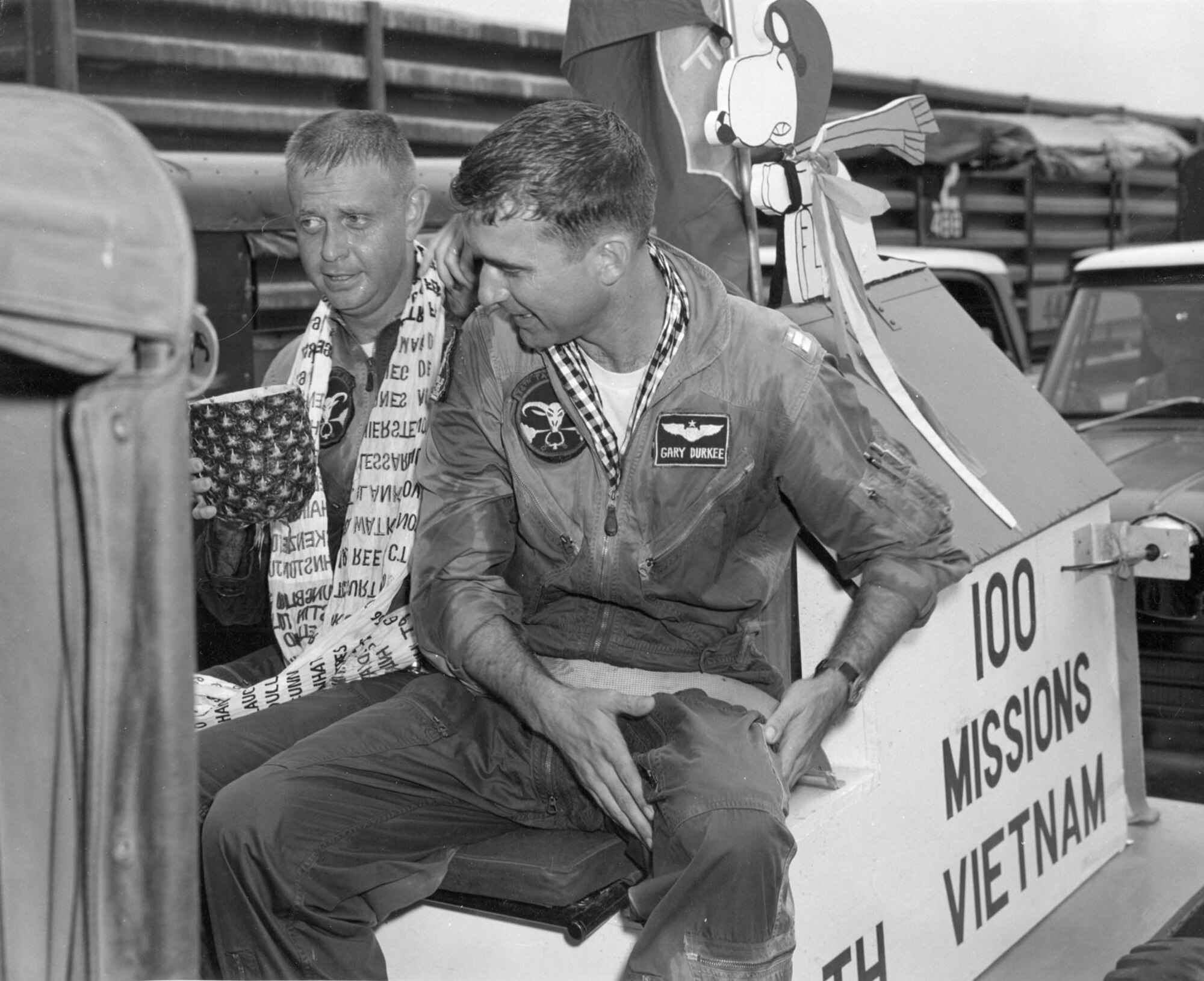 Two 34th TFS pilots, Captains Lamont “Monty” Pharmer and Gary Durkee, celebrate their 100th mission over North Vietnam in August 1968.