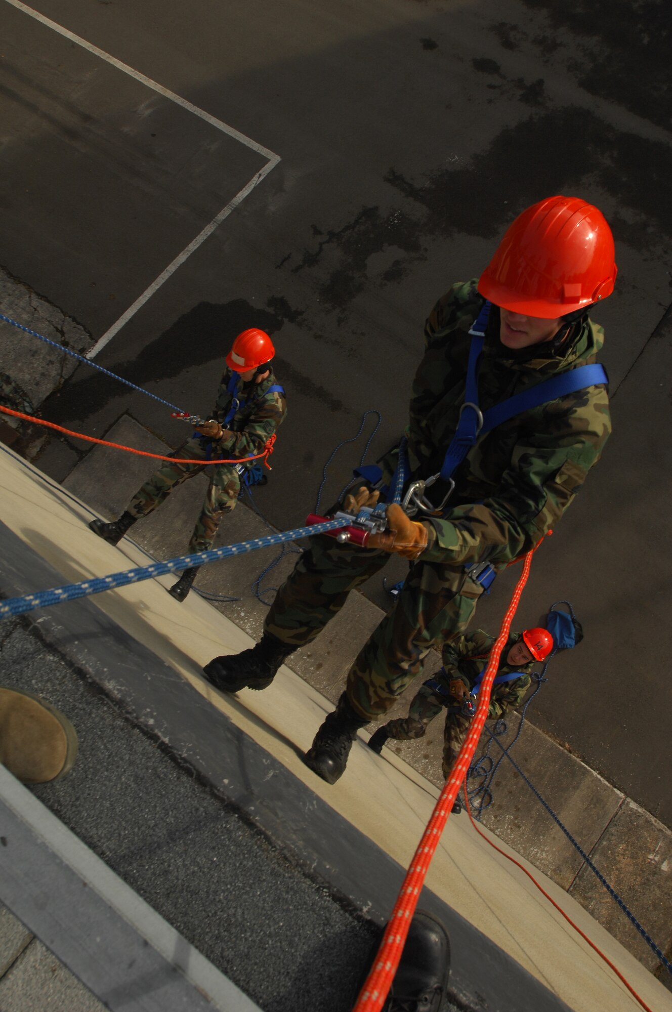 U.S. Air Forces in Europe firefighters participate in firefighter rappelling training Feb. 3, 2009, at Ramstein Air Base.  Several firefighters from all over USAFE gathered to participate in an extensive two-week training course. Firefighters rely on their rappelling skills when responding to emergency calls such as building fires. (U.S. Air Force photo by Airman 1st Class Kenny Holston) 