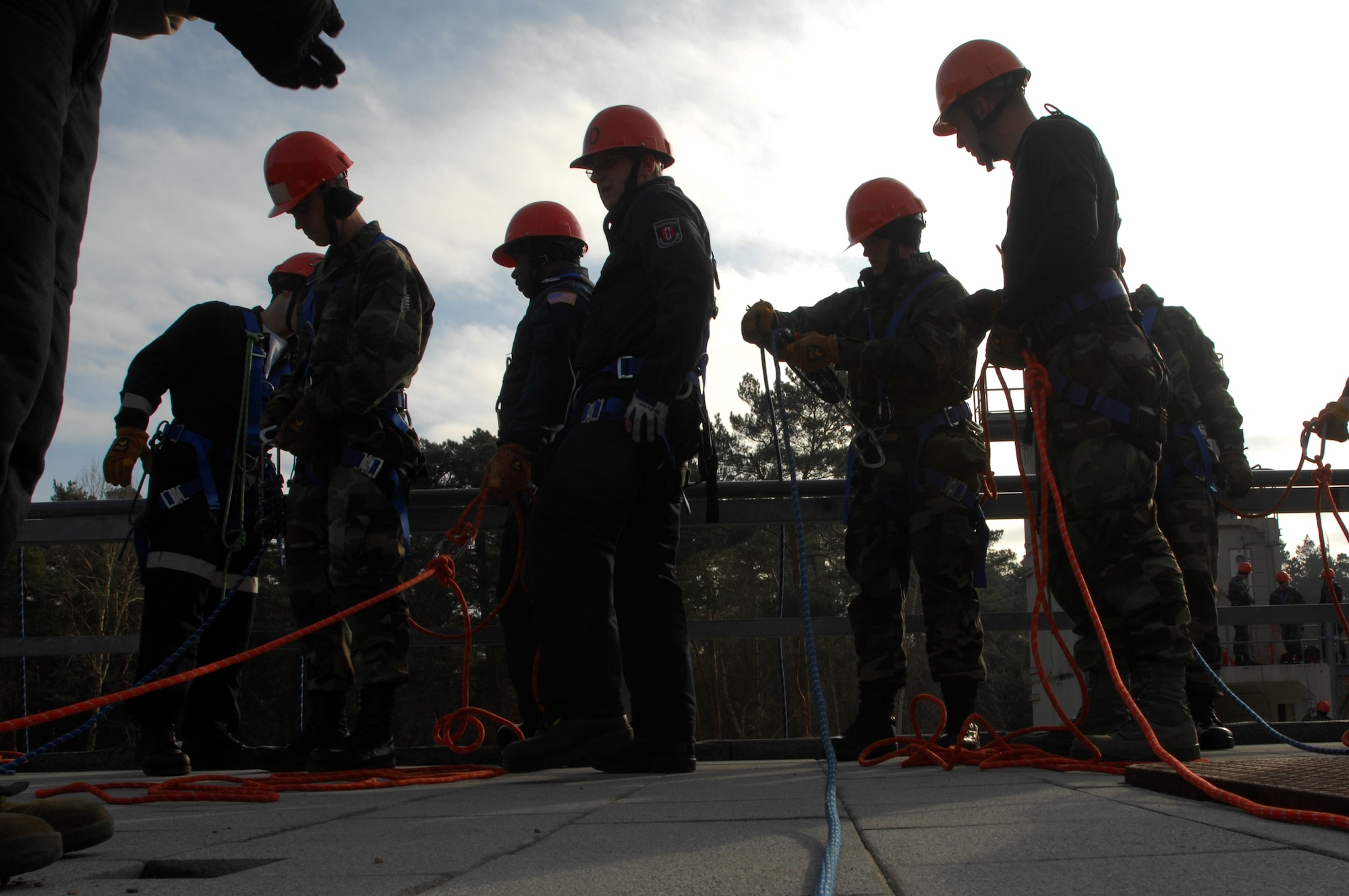 U.S. Air Forces in Europe firefighters participate in firefighter rappelling training Feb. 3, 2009, at Ramstein Air Base.  Several firefighters from all over USAFE gathered to participate in an extensive two-week training course. Firefighters rely on their rappelling skills when responding to emergency calls such as building fires. (U.S. Air Force photo by Airman 1st Class Kenny Holston) 
