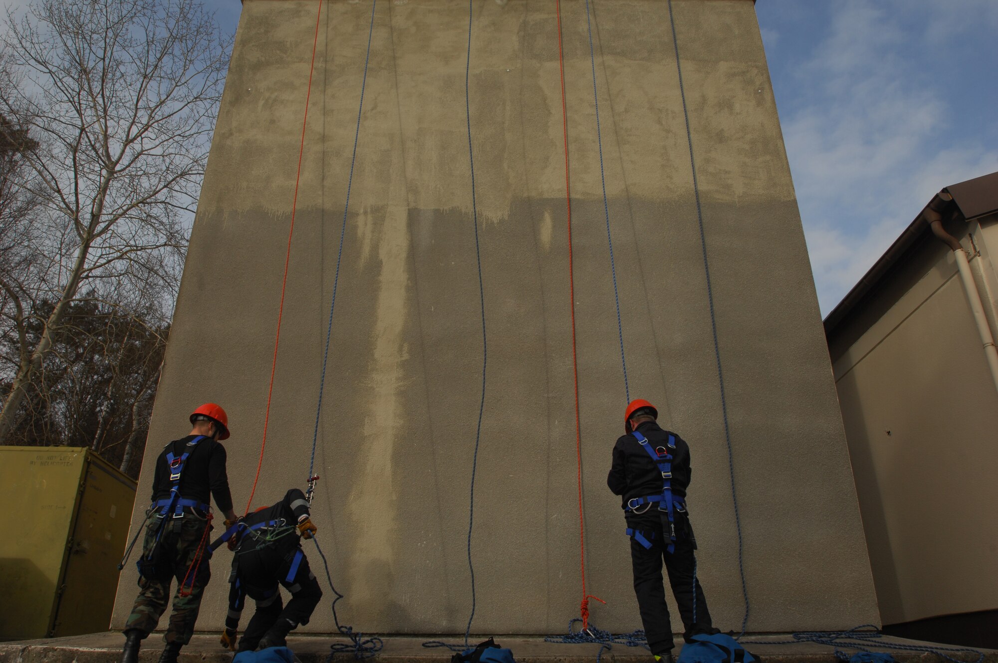 U.S. Air Forces in Europe firefighters participate in firefighter rappelling training Feb. 3, 2009, at Ramstein Air Base.  Several firefighters from all over USAFE gathered to participate in an extensive two-week training course. The rappelling portion of their training refreshed their skills while helping them pick up new techniques with new equipment. (U.S. Air Force photo by Airman 1st Class Kenny Holston) 