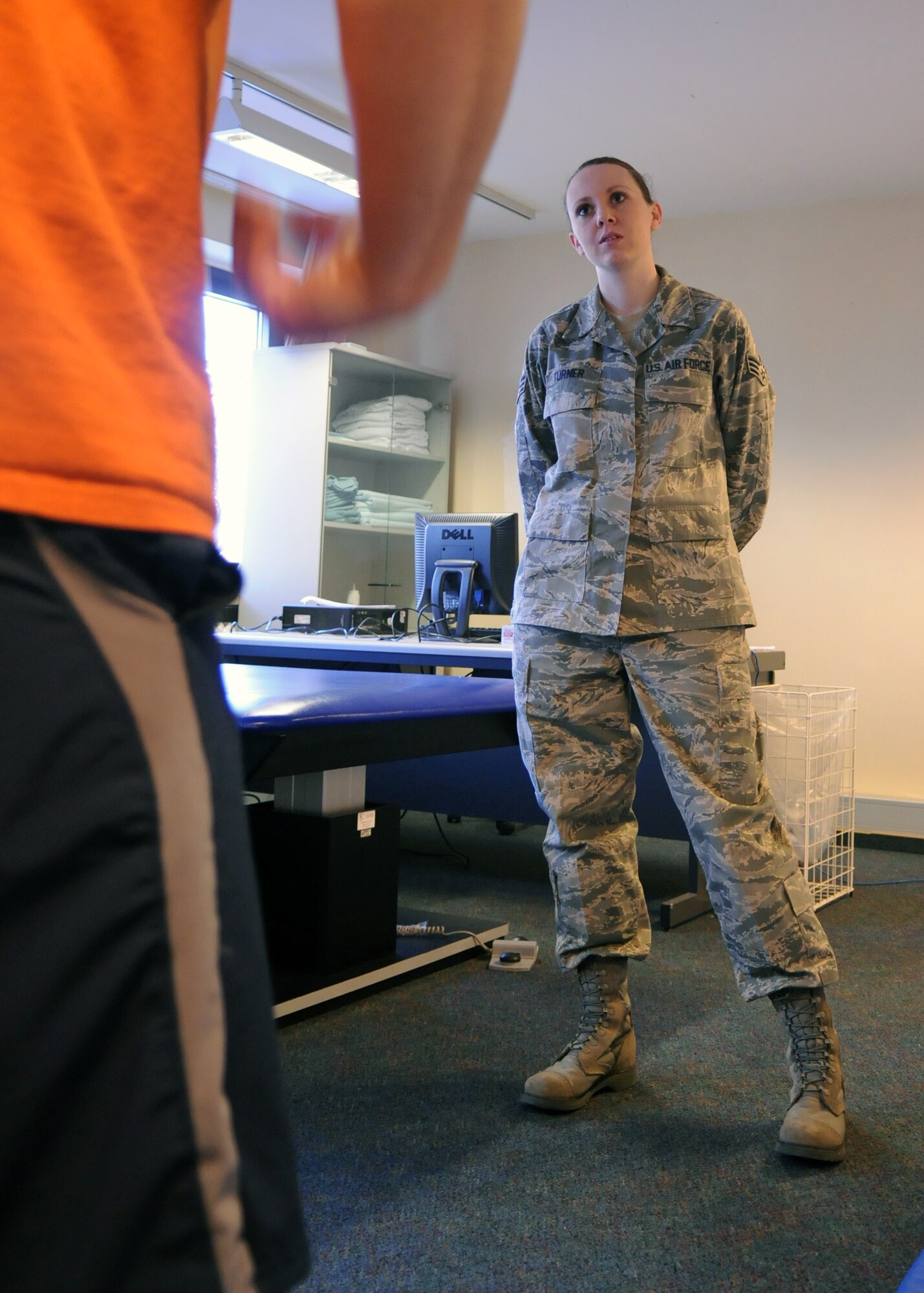 SPANGDAHLEM AIR BASE, Germany – Staff Sgt. Mack McCarthy, 52nd Medical Operations Squadron, applies an ice treatment to Staff Sgt. Matthew Bright, 52nd Fighter Wing, during a physical therapy session Feb. 12, 2009. Physical therapy is often suggested for injuries and movement problems from an illness, disease or disability. (U.S. Air Force photo by Airman 1st Class Staci Miller)