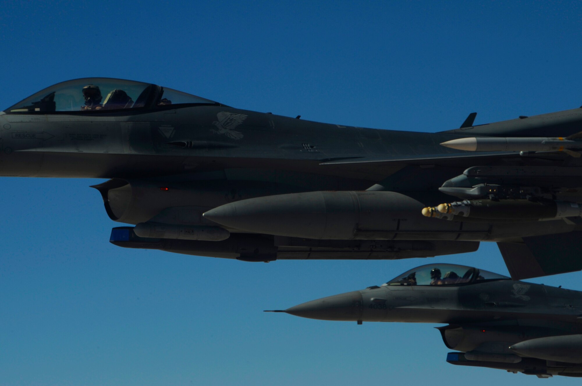 U.S. Air Force F-16 Fighting Falcons conduct close air support operations over Iraq on Feb. 17, 2009, in support of Operation Iraqi Freedom.(U.S. Air Force photo by Staff Sgt. James L. Harper Jr.)Released