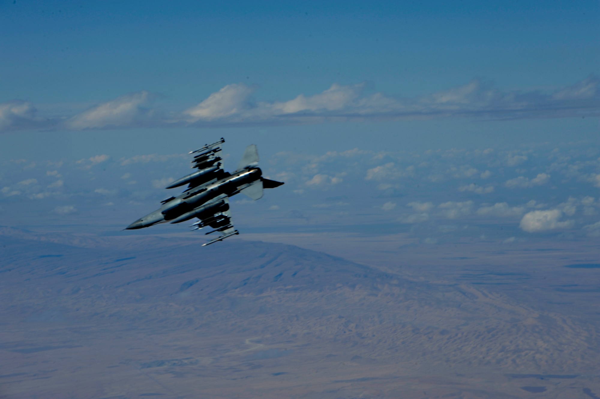 A U.S. Air Force F-16 Fighting Falcon conducts close air support operations over Iraq on Feb. 17, 2009, in support of Operation Iraqi Freedom.(U.S. Air Force photo by Staff Sgt. James L. Harper Jr.)Released