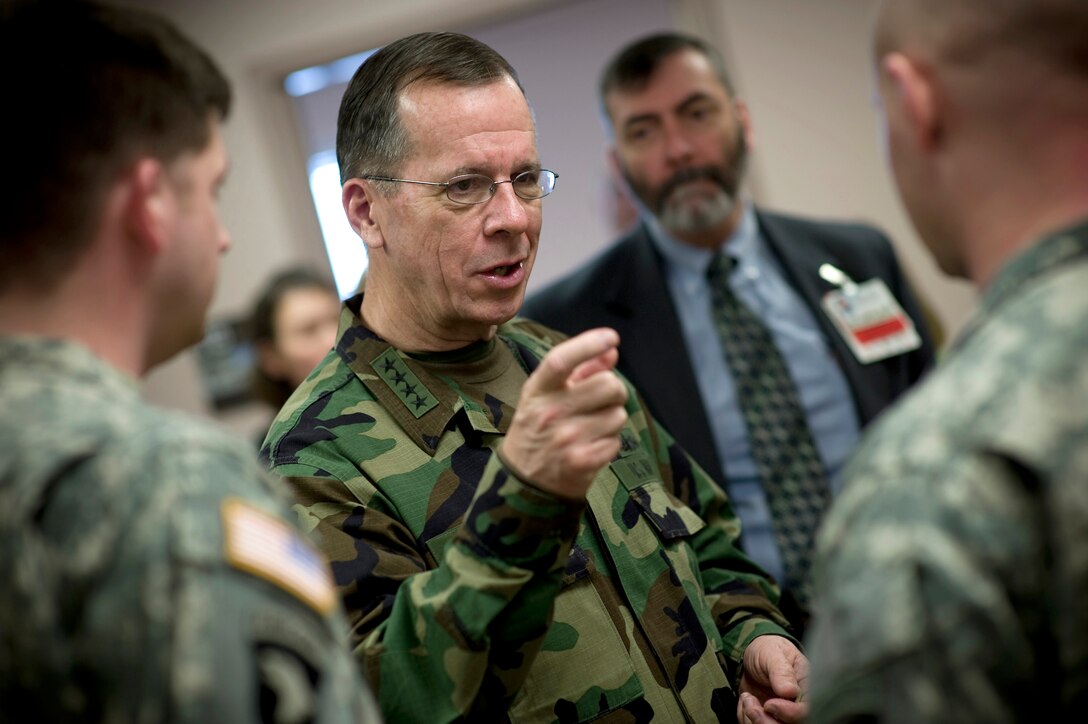 U.S. Navy Adm. Mike Mullen, chairman of the Joint Chiefs of Staff, visits patients at the traumatic brain injury Resiliency and Recovery Center on Fort Campbell, Ky., Feb. 20, 2009. 