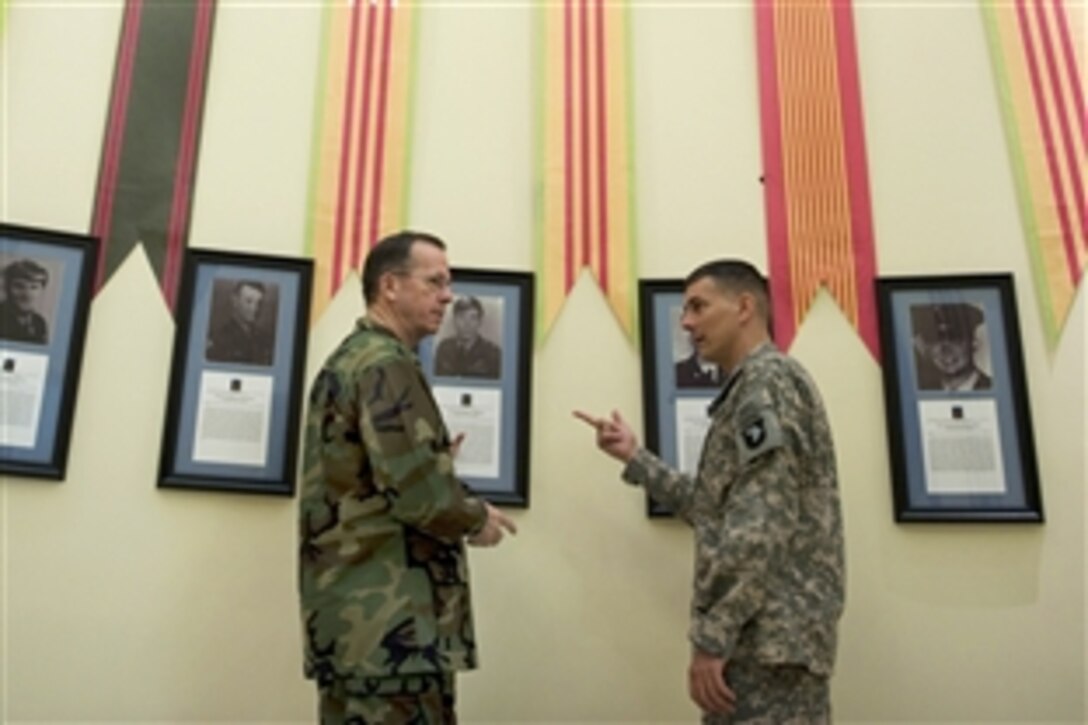 U.S. Navy Adm. Mike Mullen, left, chairman of the Joint Chiefs of Staff, goes on a tour with Brig. Gen. Steve Townsend from the headquarters of the 101st Airborne Division on Fort Campbell, Ky., Feb. 19, 2009. Mullen is on a two-day trip visiting airman on Minot and Scott Air Force bases and soldiers on Campbell.