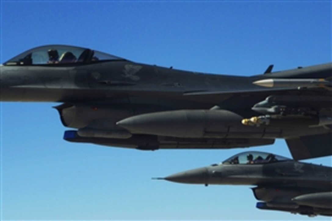 U.S. Air Force F-16 Fighting Falcons conduct close air support operations in the skies over Iraq on Feb. 17, 2009. 


