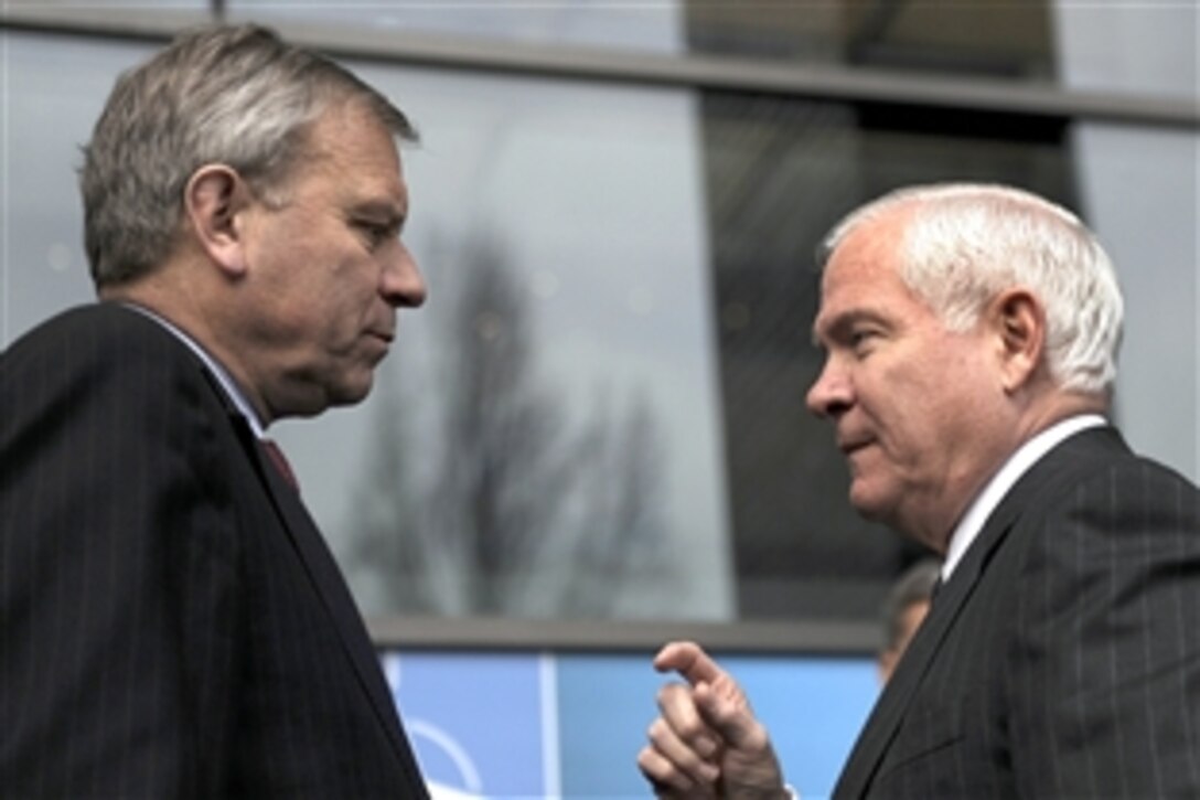 Defense Secretary Robert M. Gates, right, talks with NATO Secretary General Jaap de Hoop Scheffer during a recent visit to Krakow, Poland, Feb. 20, 2009. Gates was in Poland to attend the Krakow Defense Ministerial Conference. 