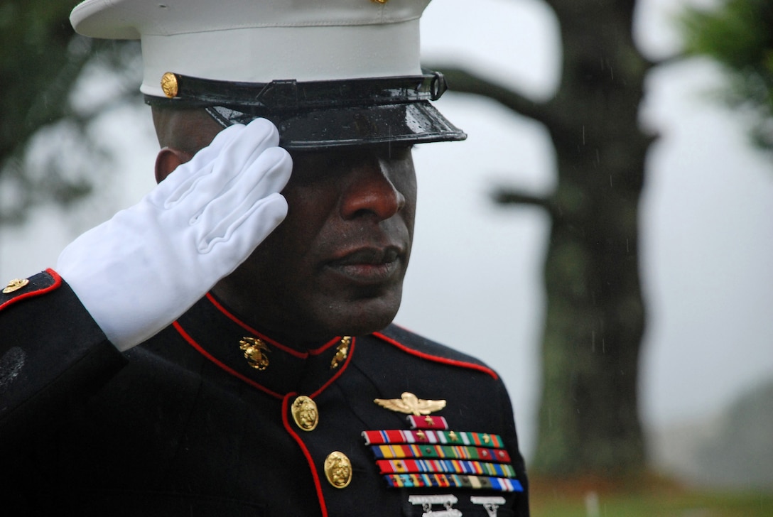 Sgt. Maj. Carlton W. Kent, 16th Sergeant Major of the Marine Corps, salutes after laying a wreath at the gravesite of the first Sergeant Major of the Marine Corps, Sgt. Maj. Wilbur Bestwick, at Skylawn Memorial Park Feb. 22. The burial site for Bestwick is incorrectly listed on his biography, and the Inspector-Instructor staff at nearby San Jose, Calif., were able to track down the correct site. Kent paid his respects during a recent visit to I&I San Jose.
