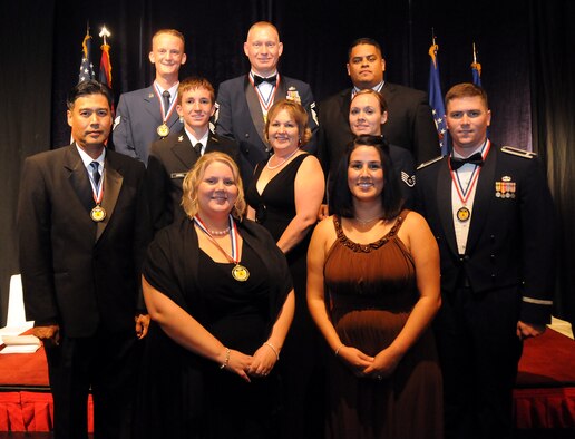 ANDERSEN AIR FORCE BASE, Guam - The 2008 Annual Award Winners posed for a photo opportunity after the Awards Banquet at the Marriott Hotel, Guam Feb 19. The theme of this year?s Annual Awards ?Fly, Flight, Win? drives home the reminder that the Air Force mission would not exist without the efforts of all Team Andersen Airmen. (U.S. Air Force photo by Airman 1st Class Courtney Witt)
