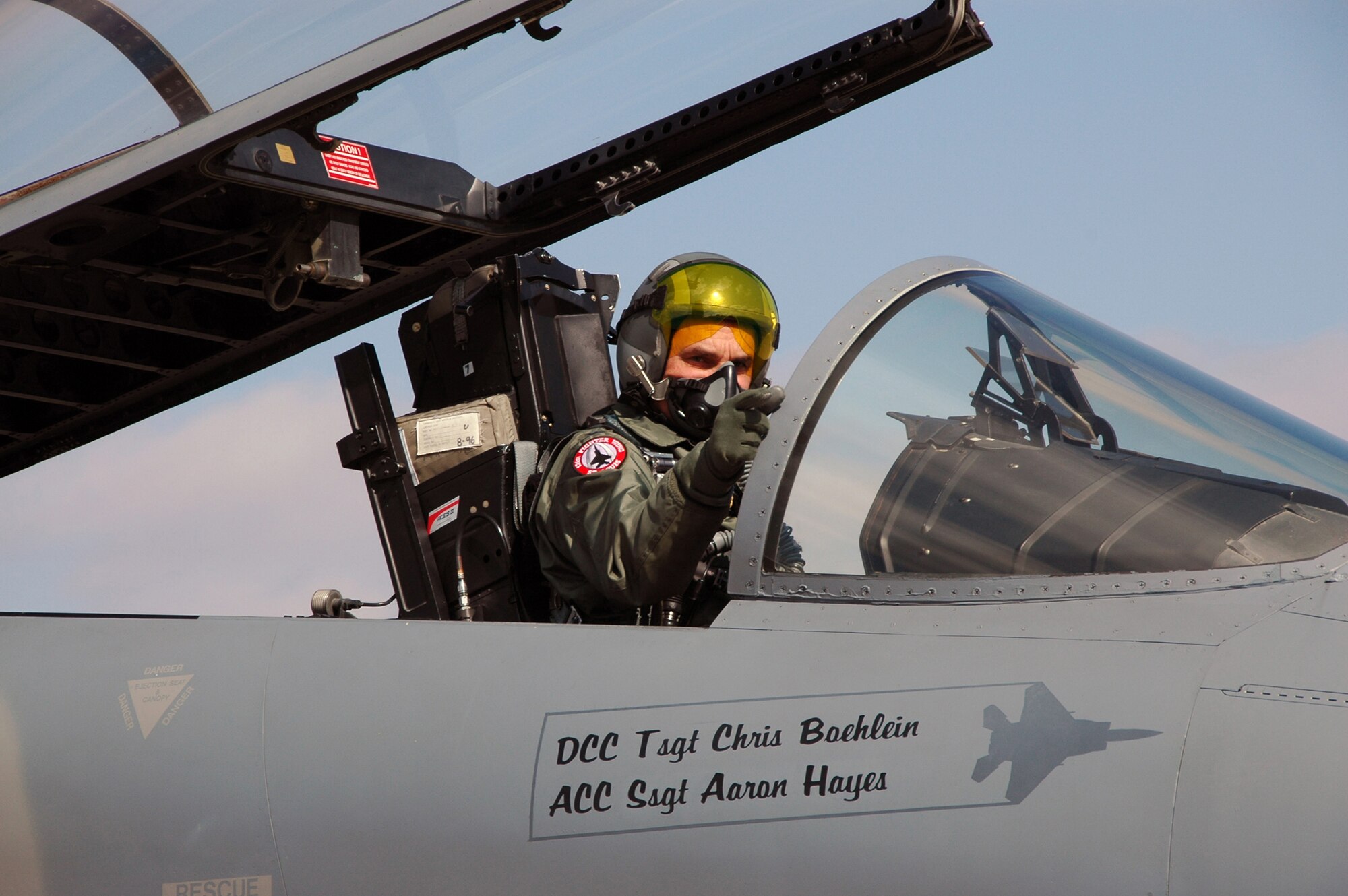 Col. Robert Leeker, 131st Wing Commander points at the crowd prior to taking his final flight from Lambert International in a F-15, Feb. 21, 2009. Photo by MSgt. Mary-Dale Amison