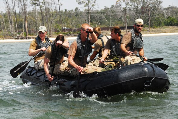 Staff Sgt. Timothy P. Davis (back left of boat) in amphibious training with his team. Sergeant Davis died of wounds suffered when his vehicle encountered an improvised explosive device in Afghanistan Feb. 20, 2009. He was assigned to the 23rd Special Tactics Squadron at Hurlburt Field, Fla. (U.S. Air Force photo)  
