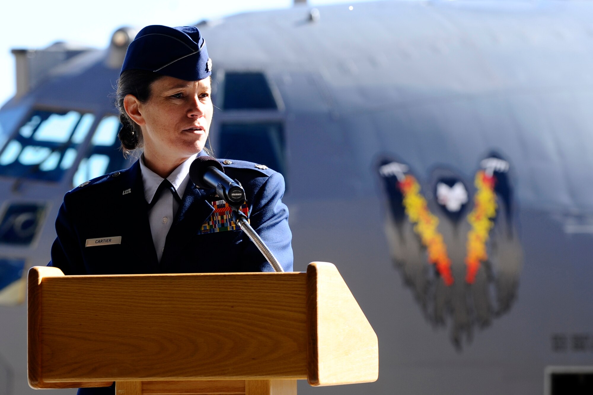 Lt. Col. Brenda Cartier, 4th Special Operations Squadron, addresses members of the squadron for the first time as their commander. Colonel Cartier, the first female commander of a flying squadron, assumed command of the squadron from Lt. Col. Jim Rodriguez.