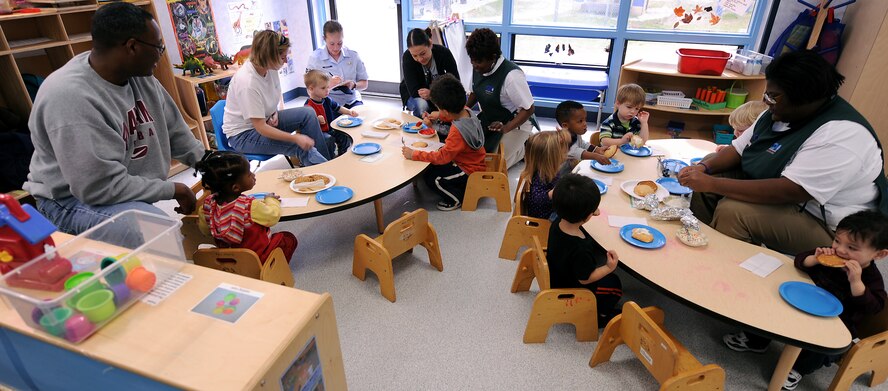 MOODY AIR FORCE BASE, Ga. -- Parents and children from the Child Development Center here spend time making cookies during the center’s Friendship Day held Feb. 17 here. The event allowed for parents to visit with their children at the center and see how they spend their days at the facility. (U.S. Air Force photo by Airman Joshua Green) 