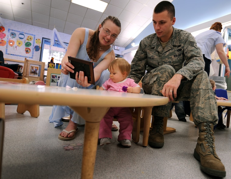 MOODY AIR FORCE BASE, Ga. -- Tech. Sgt. Steven Stewart, 23rd Logistics Readiness Squadron fuels specialist, and his wife Kimberly, spend time with their one-year-old daughter Bethany during the Child Development Center’s Friendship Day here Feb.17. The Friendship Day event allowed parents to visit the CDC and participate in activities with their children. (U.S. Air Force photo by Airman Joshua Green) 