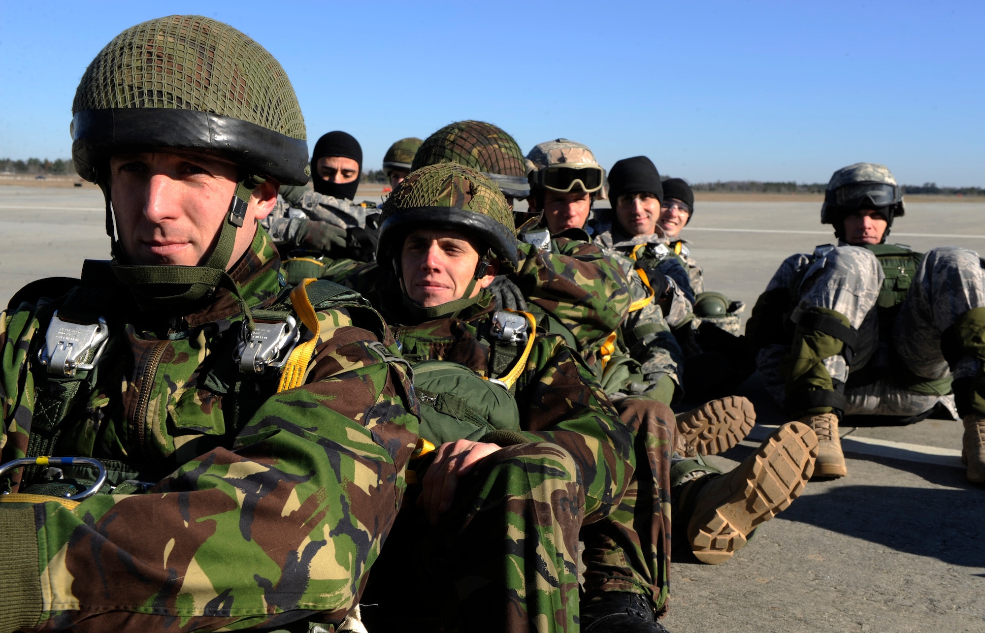 MOODY AIR FORCE BASE, Ga. -- Members of the 820th Security Forces Group and the II Squadron Royal Air Force Regiment from RAF Honington in Suffolk, Great Britain, wait to board a C-17 Globemaster III during a joint exercise here Feb. 5. Operation Winged Eagle covered training events ranging from simulated munitions to airborne operations. (U.S. Air Force photo by Senior Airman Brittany Barker)
