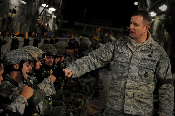 MOODY AIR FORCE BASE, Ga. -- Capt. Jason Medsger, 820th Security Forces Group, motivates jumpers before a static line parachute jump out of a C-17 Globemaster III here Feb. 5. The 820th SFG was performing a joint jump with members of the II Squadron Royal Air Force Regiment from RAF Honington in Suffolk, Great Britain. (U.S. Air Force photo by Senior Airman Gina Chiaverotti)
