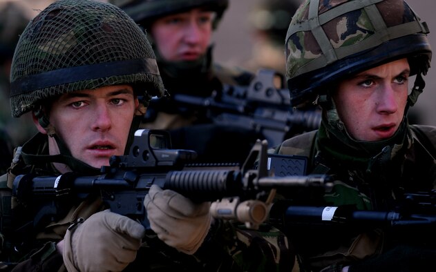 MOODY AIR FORCE BASE, Ga. -- Members of the II Squadron Royal Air Force Regiment from RAF Honington in Suffolk, Great Britain, practice clearing a house in a military operations in urban terrain village here Feb. 4. The RAF is visiting the 820th Security Forces Group for a training exercise called Winged Eagle. (U.S. Air Force photo by Senior Airman Gina Chiaverotti)