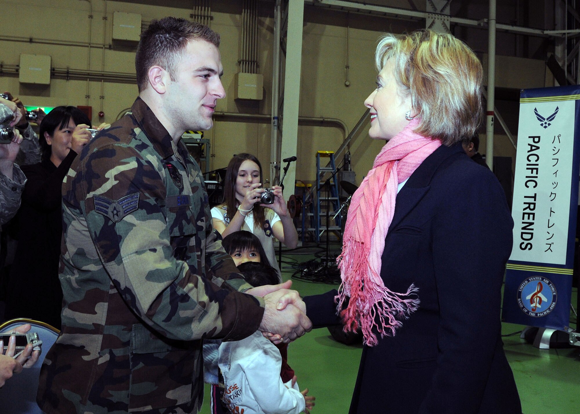 Secretary of State Hillary Clinton greets military members and their families Feb. 22 at Yokota Air Base, Japan. She took the opportunity to visit during a refueling stop there on her way back to Washington D.C.  (U.S. Air Force photo/Airman 1st Class Michael Dillon)