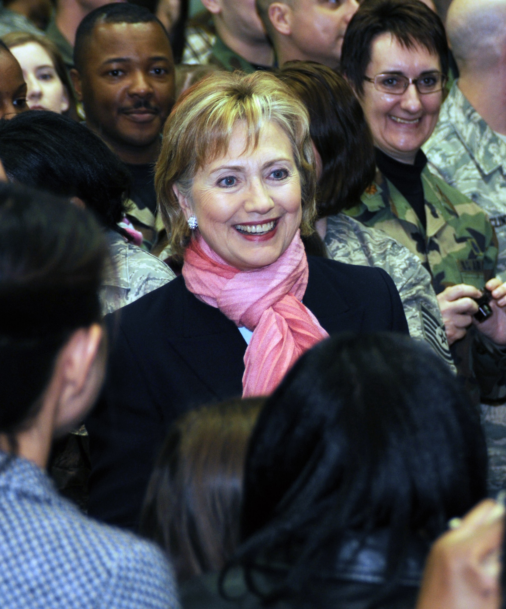 Secretary of State Hillary Clinton greets military members and their families Feb. 22 at Yokota Air Base, Japan. She took the opportunity to visit during a refueling stop there on her way back to Washington D.C. (U.S. Air Force photo/Airman Devin Doskey)