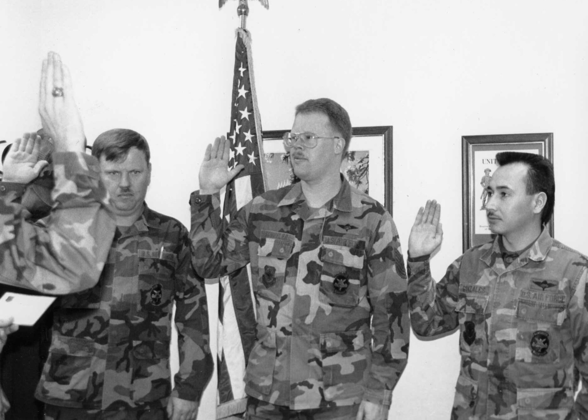 Master Sgt. Kirby Schueler raises his hand circa February 1991, reenlisting just before a deployment to the Middle East in support of Operations Desert Shield/Desert Storm. (Courtesy photo)